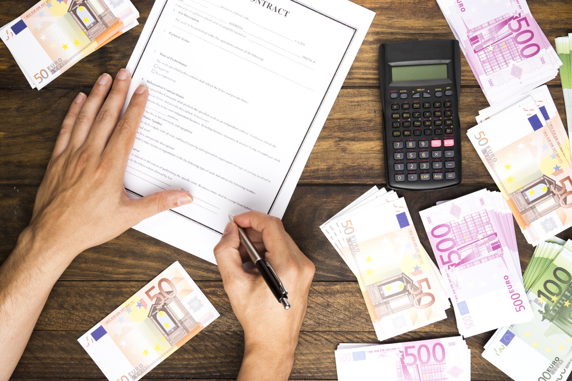 top view man signing contract